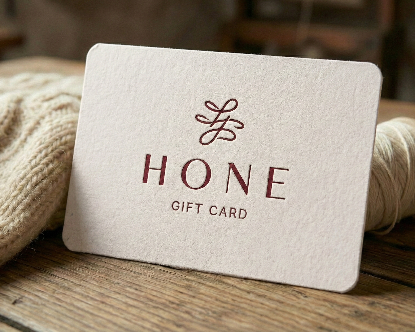 a white gift card for hone