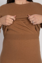 Close-up detail of the Hone Signature Knit Dress in Camel, demonstrating the invisible lift-up nursing access panel for discreet breastfeeding or pumping.